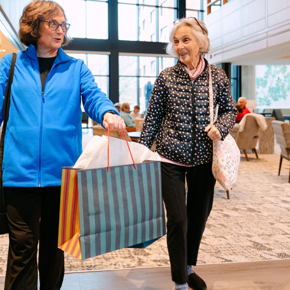 Women just in from shopping nearby